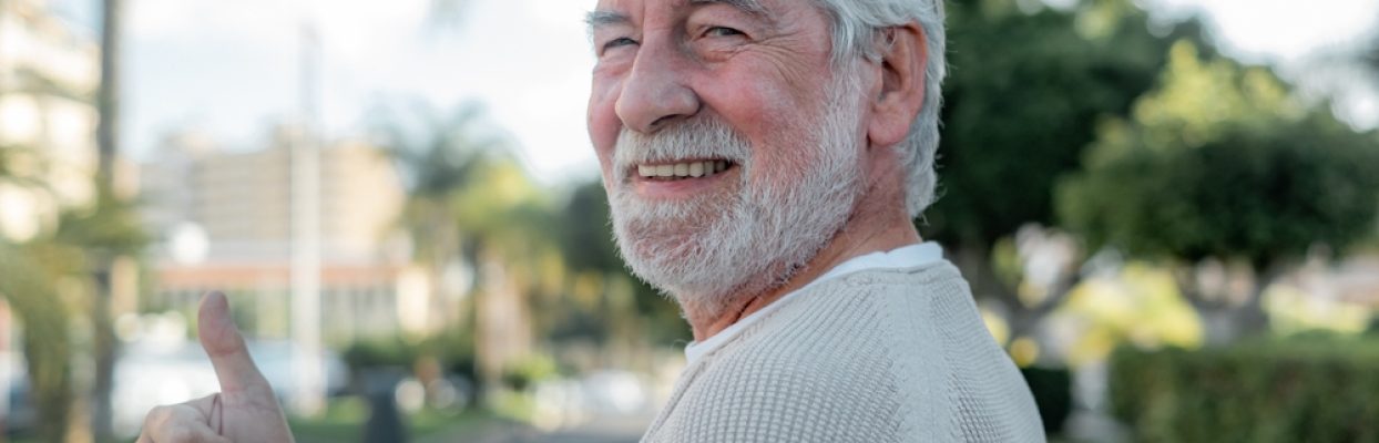 Portrait,Of,Cheerful,Optimist,Senior,Man,Looking,At,Camera,With