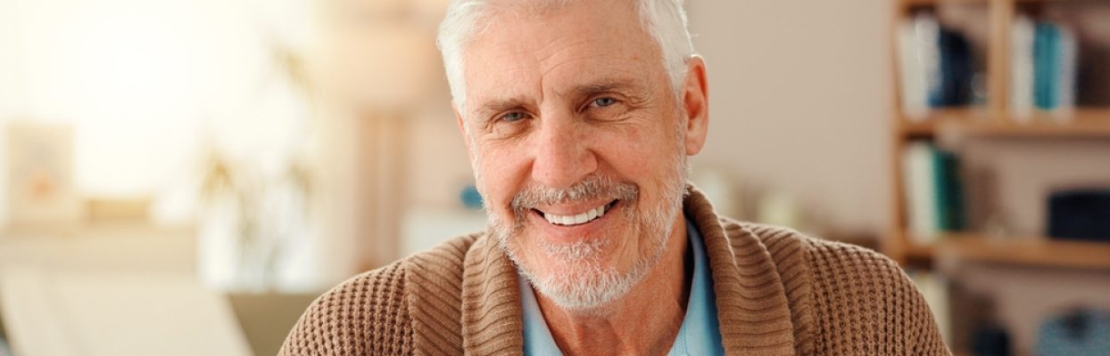 Senior,Man,,Happy,And,Portrait,On,Sofa,In,Home,,Relax